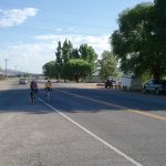 Catherine and Jackie rolling into Sigurd, the first checkpoint of the day.